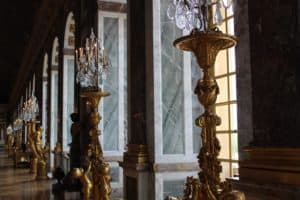 Beautiful statues and lighting line the Hall of Mirrors