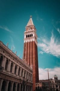 The bell tower looms over Venice