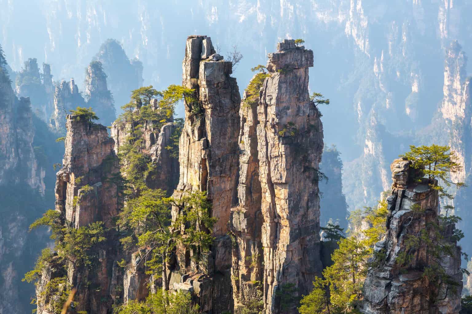 Zhangjiajie min scaled The Natural Wonders of the World are all incredible sights to behold in many parts of the world. All these places attract many tourists throughout the year. A global poll was made by the Seven Natural Wonders organization in 1997 and contained seven natural wonders, which are the Northern Lights, the Grand Canyon, Paricutin, Mount Everest, Harbor of Rio de Janeiro, Victoria Falls, and the Great Barrier Reef and there are much more but these are the most famous and the most admired across the globe.