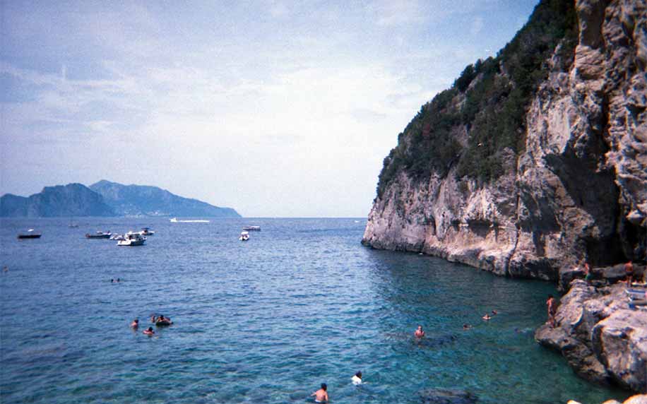a shot of the ocean and coastline of the amalfi coast