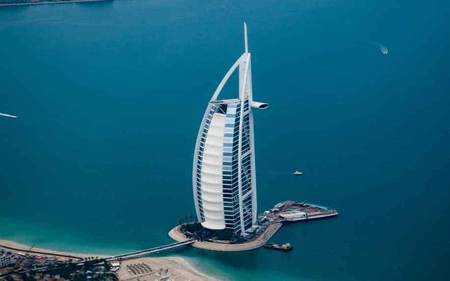 a picture of Burj Al Arab, do by Dubai's sea front where fun activities in dubai occur