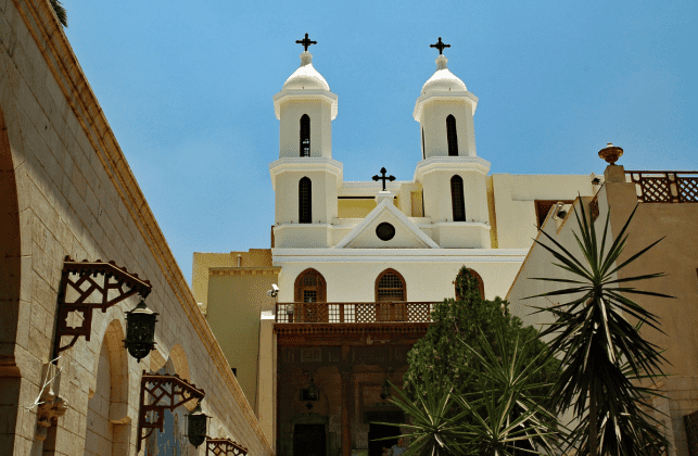 The gorgeous church with twin pillars immersing from it's roof tops stands tall in Egypt