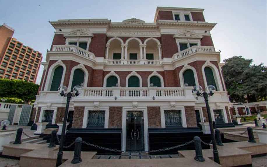 a picture of the front facade of the aisha fahmy palace