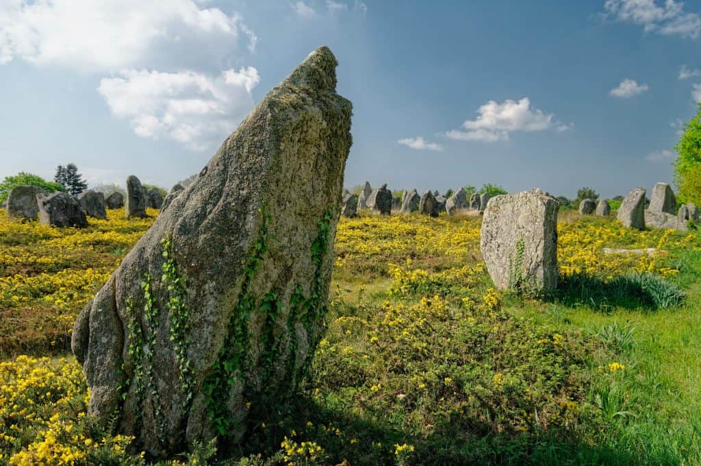 Visiting the megalithic monuments in Carnac is one of the top things to do in Brittany, France (Photo Credit: Unsplash)