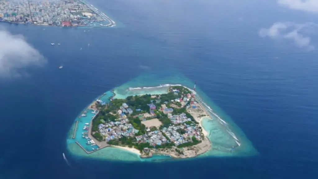 Aerial view of the Maldives islands Welcome to the Maldives, a paradise situated in the Indian Ocean and lies southwest of Sri Lanka and India. With its picture-perfect landscapes, natural beaches, and tranquil ambience, you will find your true relaxing getaway. The Maldives consists of 26 atolls and more than 1,000 local islands, with a population of around 400,000 residents. The Maldives' capital is Male, where the majority of the population lives. 