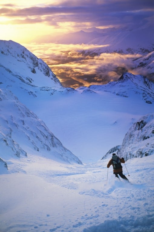 Snow Holiday Destinations - A Skier on a Mountain Slope