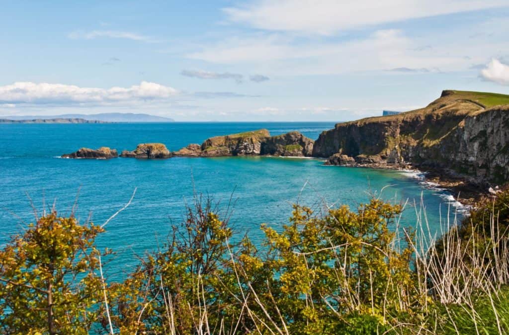 A Brief History of Ireland - Stunning Seashore View to Carrick-a-Rede Rope Bridge in Northern Ireland