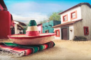 Mexico Travel Statistics | Mexican Hat on a Serape in Village