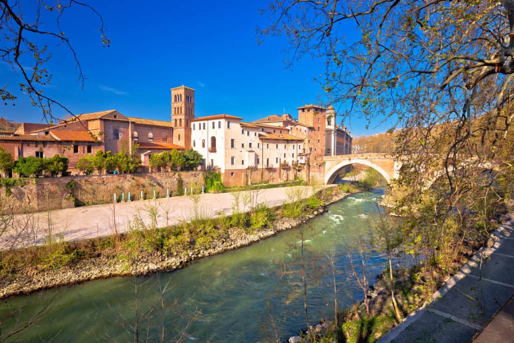 27727410 tiber river island and rome waterfront view One of the most visited destinations around the world, Rome, Italy, is a tourist hub with its abundance of natural landscapes and beautiful churches, museums, squares and attractions.