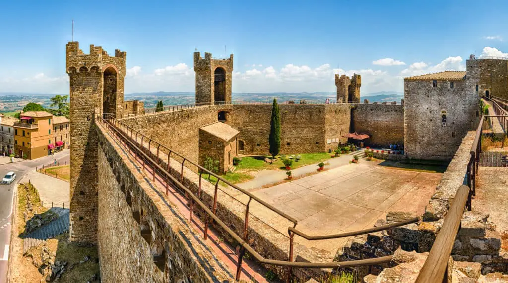 29808512 medieval italian fortress iconic landmark in montalcino tuscan A beautiful city in the region of Tuscany, Siena is only 48 km south of Florence. Siena, like other cities in Italy, is famous for its magnificent architecture. The city started to flourish in the 12th century and reached its golden age in the 13th and 14th centuries. The city was established by the Etruscan tribes but it became a known town in the Roman period of Emperor Augustus.