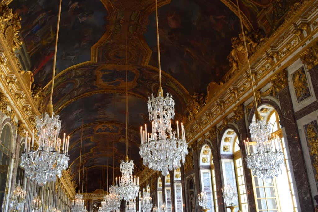 31946552 versailles france may 022018 hall of mirrors of the famous palace of versailles in france From the city lights of Paris to historic World War II sites, France has something to offer for every tourist. The country has inspired artists, authors, and visitors alike for centuries with its beautiful scenery, medieval architecture, and romantic tourist attractions. No matter what you’re looking for from a European vacation, taking a trip to France will not disappoint. From Paris to Marseille, here are our top 7 things you must do during your French holiday.