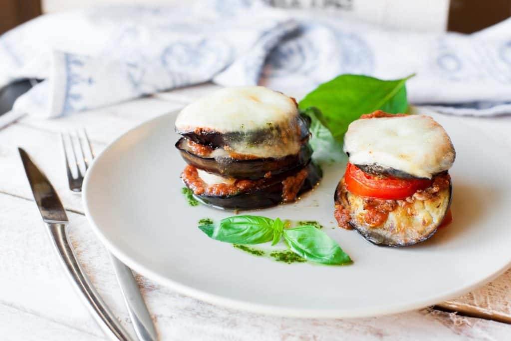 47279886 parmigiana di melanzane baked eggplant italy Naples is a city famed for its food and drink as well as its beautiful coastlines and architecture. But what exactly do Neapolitans eat daily? We have collected the top eight Naples dishes you won’t want to miss on your trip. These are classics and staples that locals eat every day, and each has a rich history and story of cultural significance behind it. Forget Amalfi limoncello and pasta Bolognese, these dishes are all authentic local essentials which reflect the very function of society itself in Naples. In fact, some of the most quintessentially Italian dishes originate in Naples, as we will see with some items on this list. 