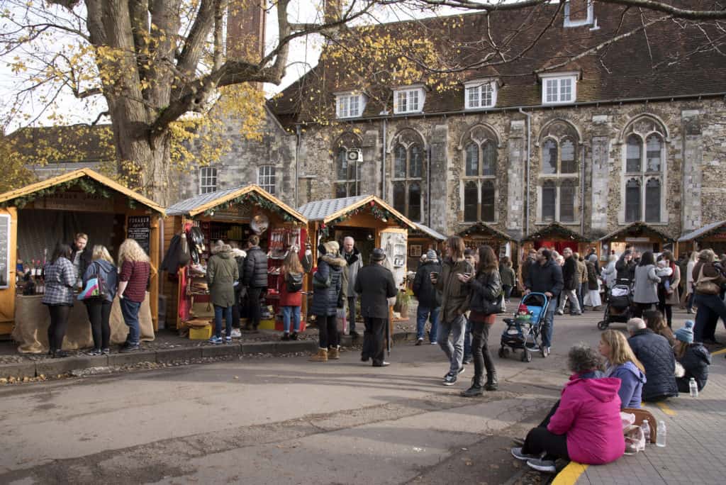 winchester christmas market things to do Winchester is a small city in the south of England that is packed full of hidden gems. The first time I visited Winchester I was there just to take a novelty photograph so I could make nerdy references to the cities name. Soon after arriving however, I fell in love with the place and its beautiful architecture and ended up living there for three years. So, what are the best things to do in Winchester? Read on to find out!