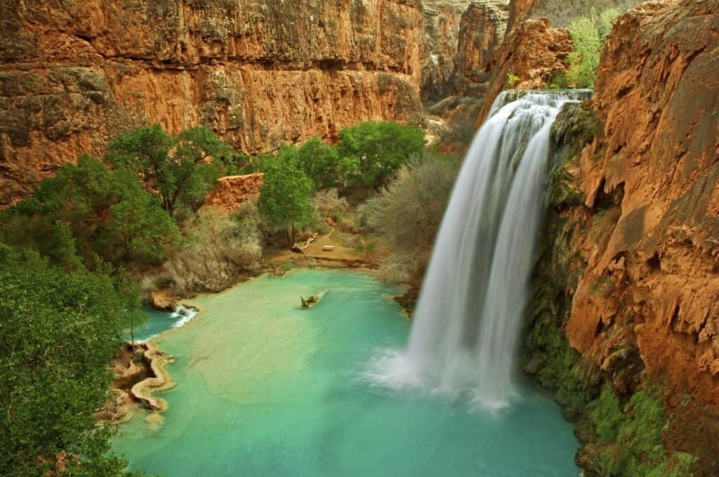 2576537 havasu falls Arizona is located in the southwest of the United States of America, bordered to the west by California, to the northwest by Nevada, to the east by New Mexico, and to the northwest by Utah. Every state in America has a capital, and Arizona has its capital which is Phoenix, located in the south of the state, it is the largest city in it, and it is also the sixth largest state in the United States of America.