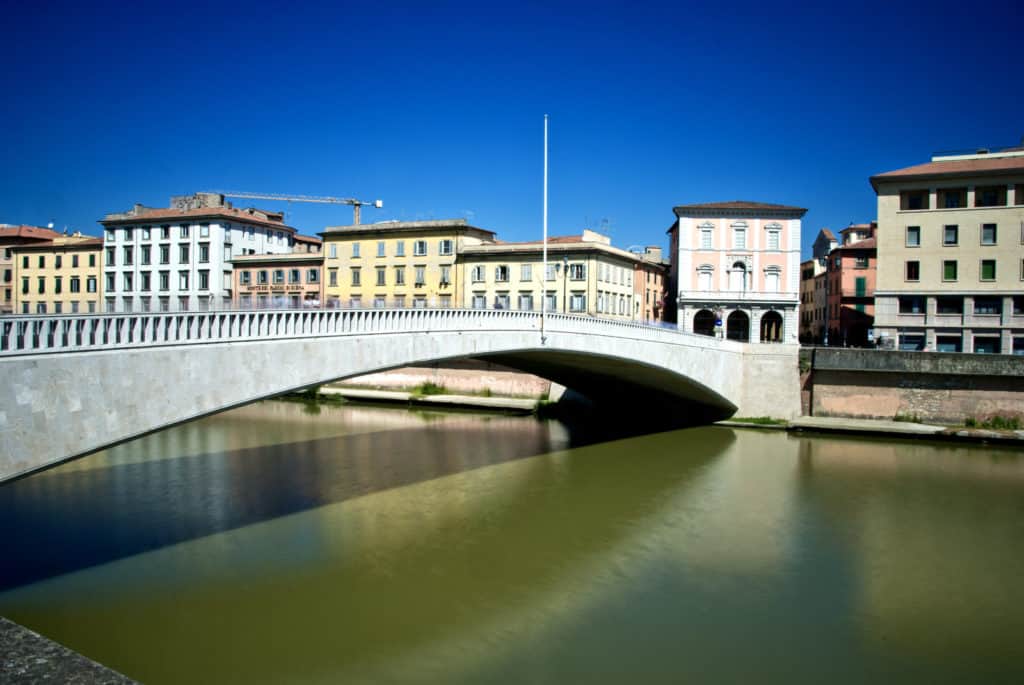 8024942 ponte di mezzo pisa italy Located on the western coast of Italy, Pisa is a renowned city in Tuscany. Most tourists think that this city is only known for the Leaning Tower of Pisa, but it has many other amazing sites. The city has a population of 91,000, which is one of the smallest populations in Italy and it is only 20 minutes away from the Ligurian Sea. You can ride the train to Pisa directly from any major city in the country.