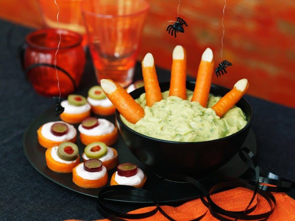 11335311 A Halloween dip with carrots and canapes No matter what your budget, time or space is, you can still host a great Halloween party for kids and your guests. Read our party guide for some inspiration and guidance on throwing a frightfully fun kids Halloween party. 