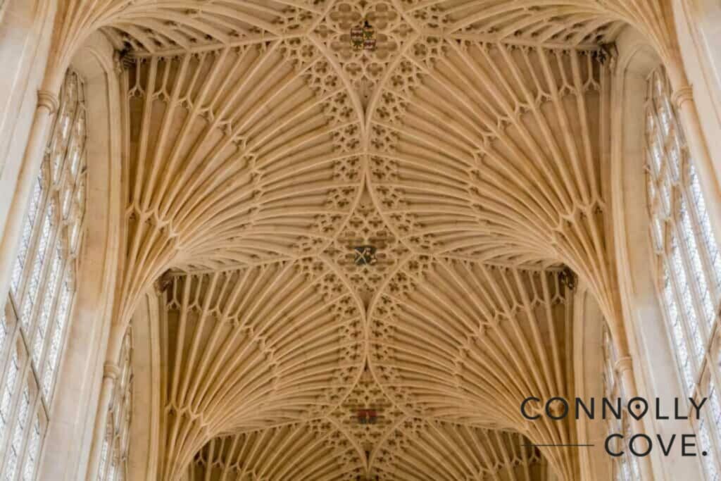 Detail of the Gothic stone vault in Bath Abbey on a sunny day