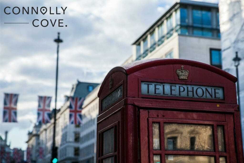 Many tourists take photos with the iconic telephone booths in the UK.