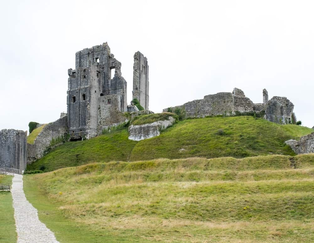 Corfe Castle Dorset abandoned castles in England min The Middle Ages were the height of castle-building in England. Many of the castles back then were built to act as a defence against different forms of foreign invasion and have continued to serve such a purpose throughout their lives. Centuries later and despite the owners' efforts, life in many of the castles became difficult, resulting in a large number of abandoned castles in England.