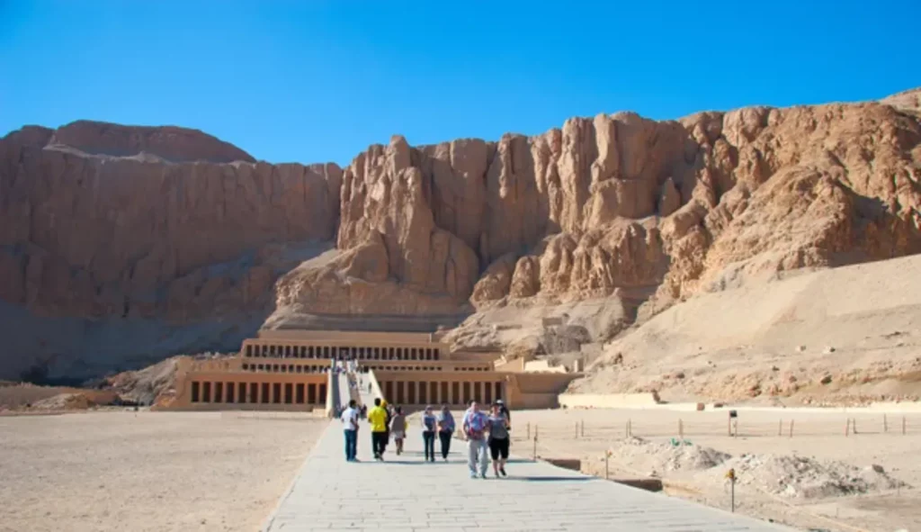 depositphotos 25247669 stock photo the temple of hatshepsut near 1 In the arid expanse of Egypt's desert landscape, where the golden sands of time whisper ancient tales, lies a monumental testament to a remarkable reign - the Mortuary Temple of Hatshepsut. 