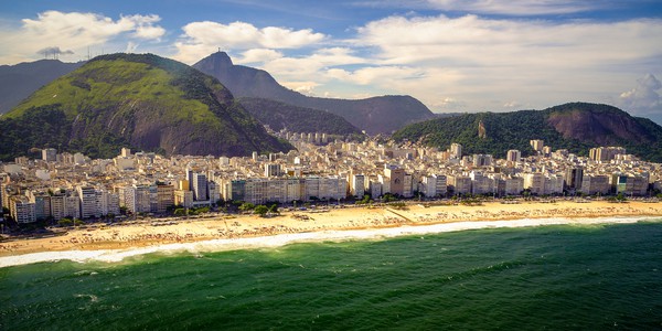 Copacabana Rio de Janeiro You know those cities that when someone mentions their names, you instantly think of a particular image that got stuck in your mind, even if you didn't go there…. Well, Rio de Janeiro is one of those cities. We bet this happened when you first read its name in the title… didn't it?! Perhaps Cristo Redentore, which dominates the city from the top of Corcovado, or Sugarloaf Mountain with its cable car.