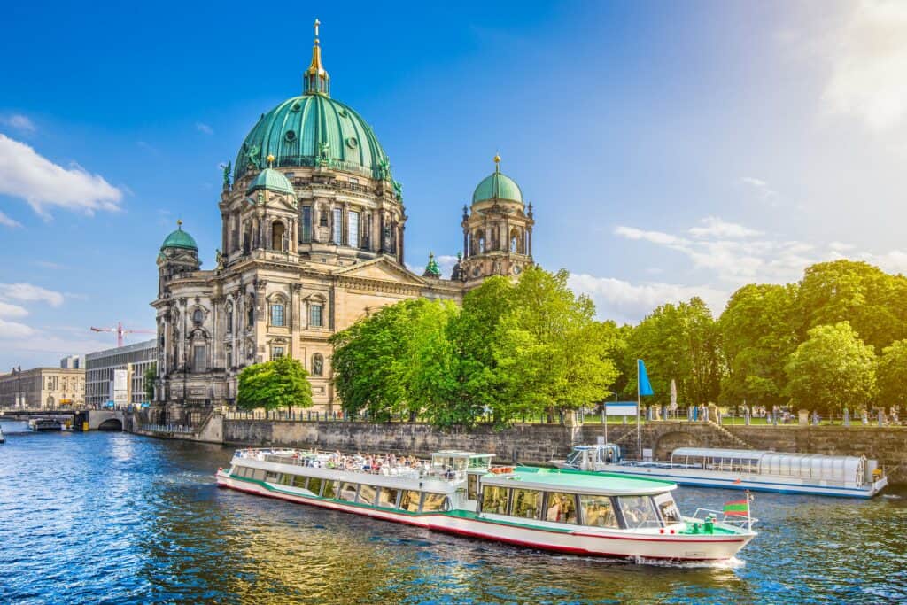 Berlin Cathedral min Berlin is located in northeastern Germany and is the capital of the country. It is the second-largest city in the European Union and it is 180 km south of the Baltic Sea. Berlin was in the past a commercial and geographical hub between East and West.