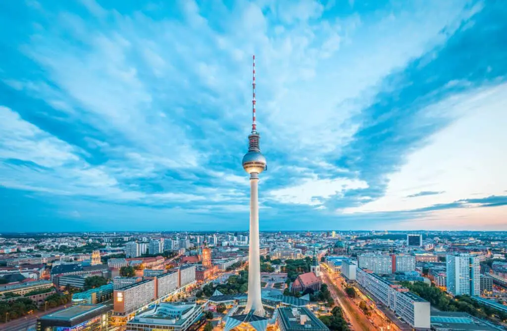 Berlins Television Tower min Berlin is located in northeastern Germany and is the capital of the country. It is the second-largest city in the European Union and it is 180 km south of the Baltic Sea. Berlin was in the past a commercial and geographical hub between East and West.