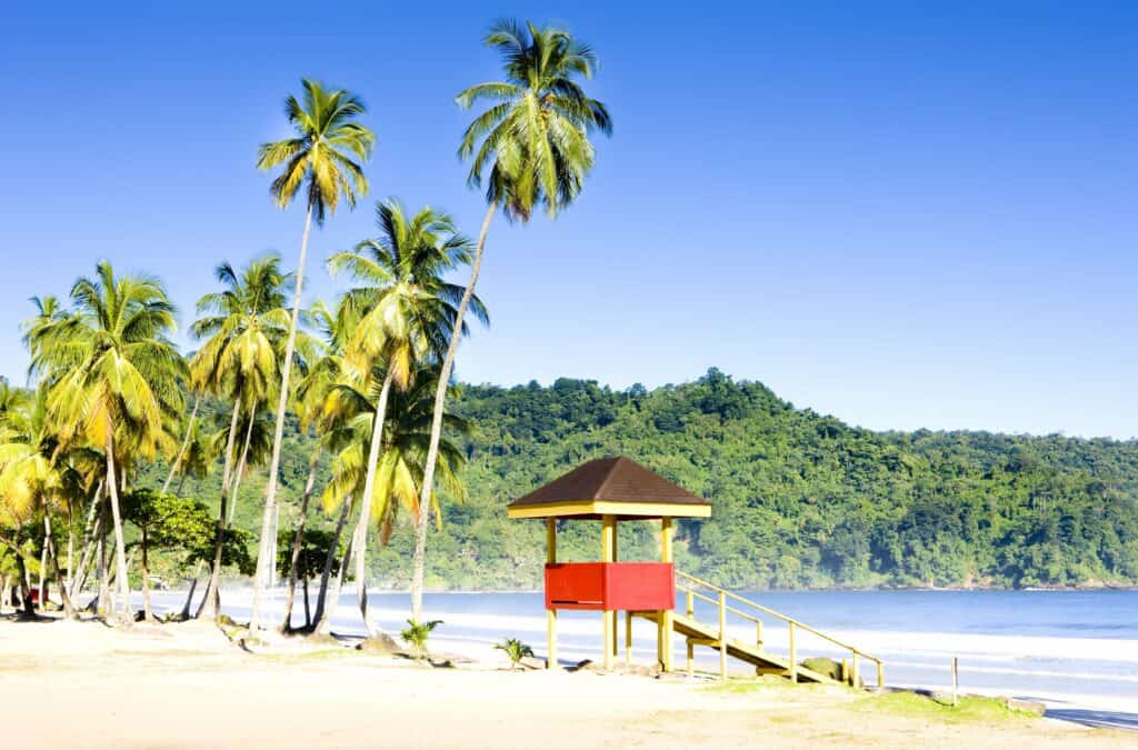 Maracas Bay in Trinidad min The Republic of Trinidad and Tobago is located in the Caribbean Sea and it includes two islands and several small islands. Its land area is about 5,128 square km and it is ranked 175th in the world in terms of area. Trinidad and Tobago is located near the continent of South America, specifically near Venezuela, which is only 11 km away.