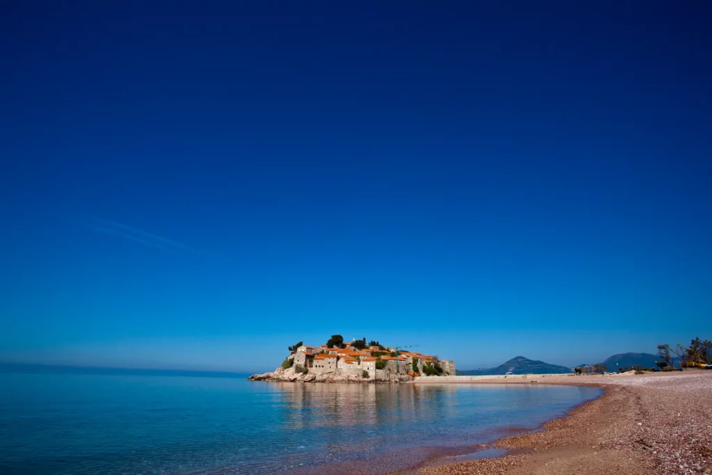 4949860 island peninsula sveti stefan montenegro As winter chills wave goodbye, set your goal to discover some of the top budget-friendly Destinations this summer. From the cobblestone streets of Poland to the vibrant medinas of Morocco, we've curated a list of ten budget-friendly destinations this summer that promise unforgettable experiences for UK travellers.