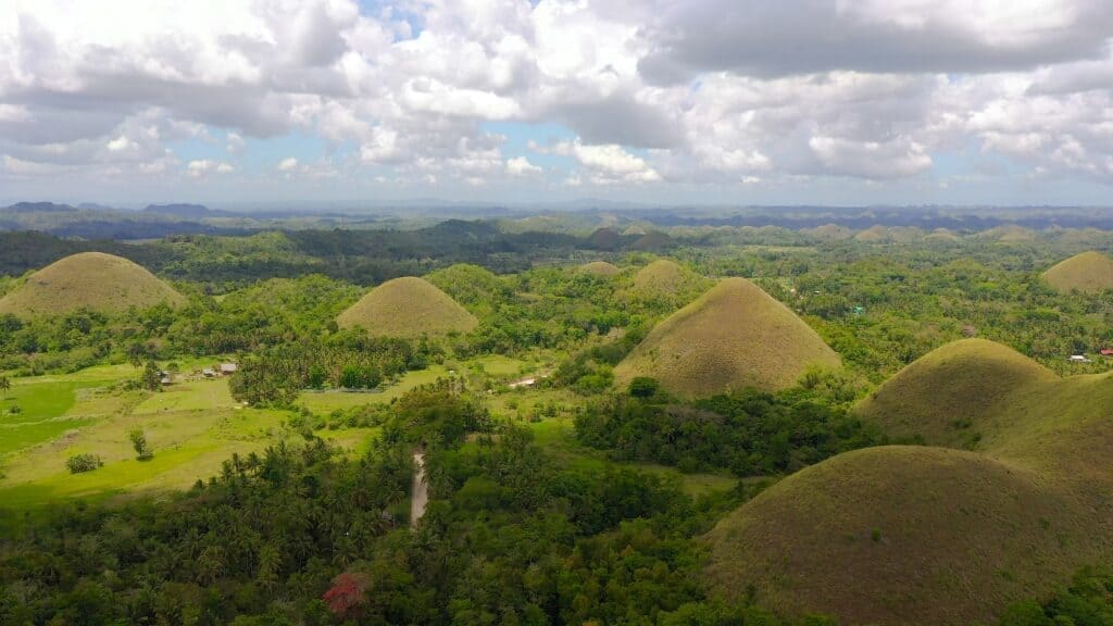 Chocolate Hills min The Republic of the Philippines is to the west of the Pacific Ocean in southeastern Asia. It consists of 7107 islands, that's why it is considered an archipelago. The country includes three main divisions based on which the government is classified: Lulzen, Visayas, and Mindanao, with Manila as its capital.