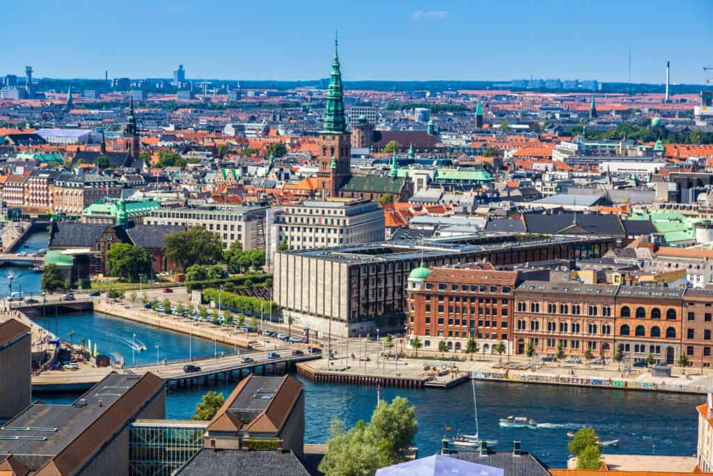Copenhagen min 1 Rich in all possible aspects, the alluring capital of Denmark, Copenhagen is the epitome of Scandinavian beauty and is one of the world’s most popular tourist destinations. 
