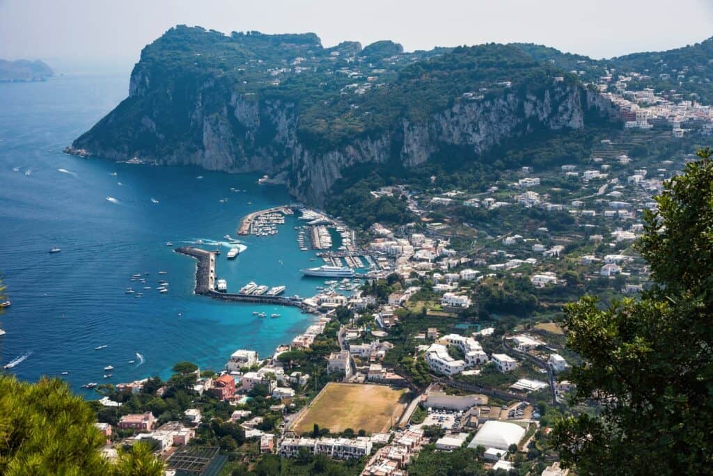 Capri Island min Earth bestows upon us some celestial places that seem to be part of a magical world. The Amalfi Coast is one of those irresistible spots that our planet is blessed with. Images of more than a few elements of nature coming together to create a glamorous scene are what this spot is all about. It is one of the most popular holiday destinations in Italy; you should definitely add it high to your list.