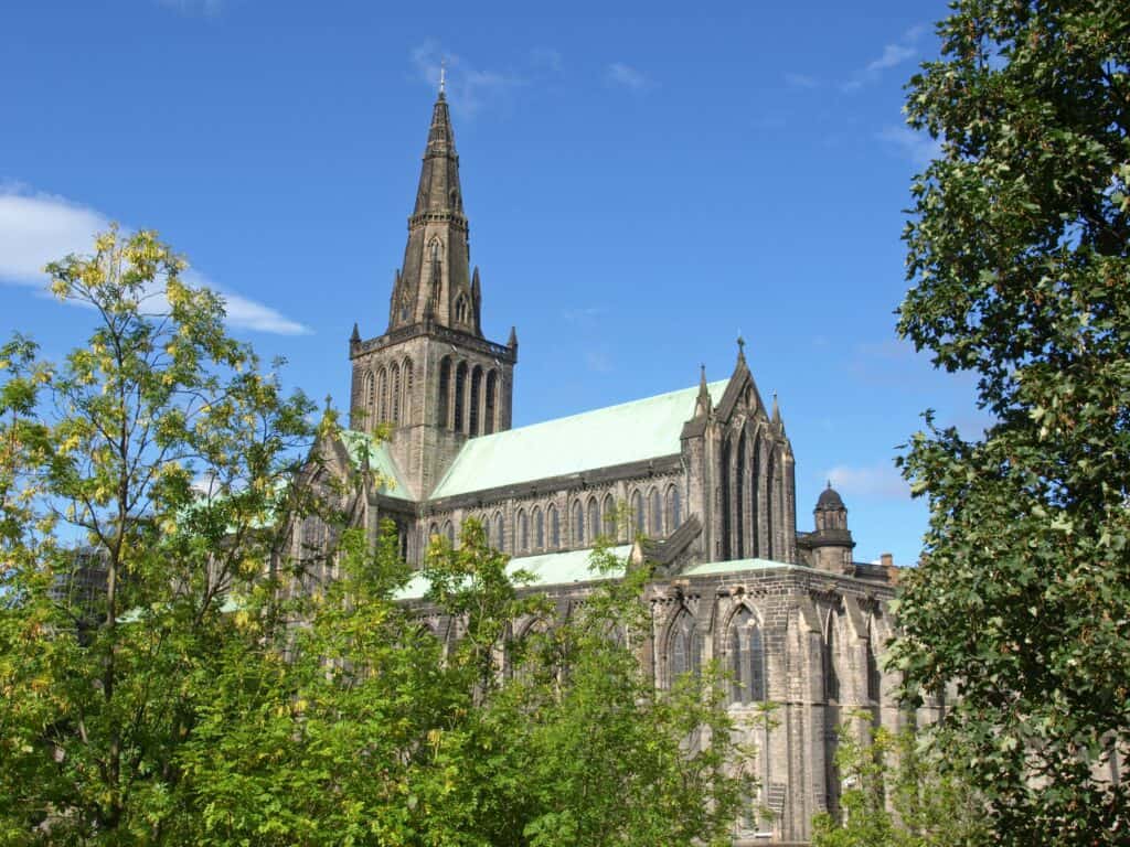 Glasgow Cathedral min The city is full of different activities and sights to visit that satisfy every taste and interest. Glasgow is the perfect destination for both solo travelers, groups, and even families. The list of things to do while you explore Glasgow, the largest city in Scotland, is a long one for sure.