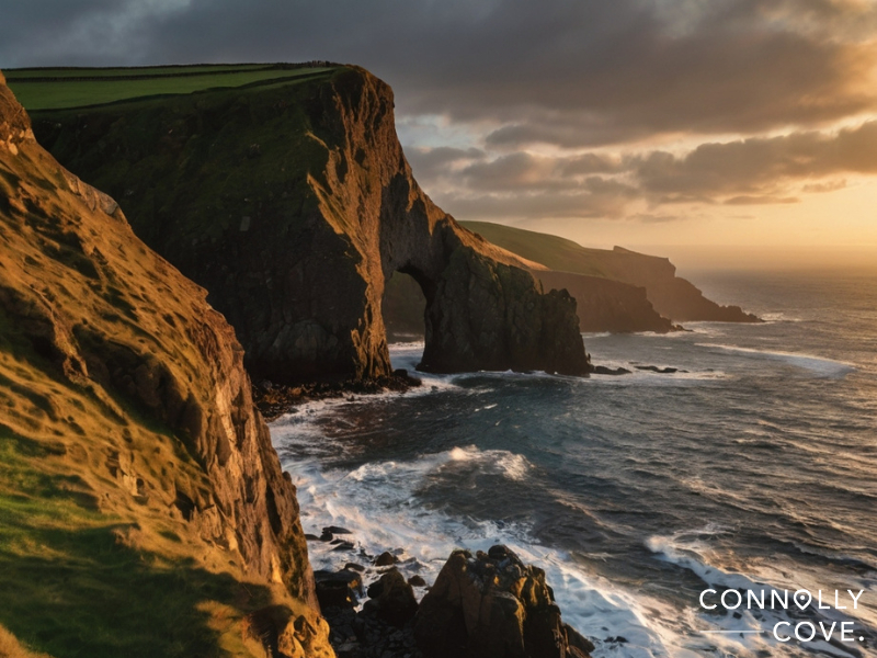 weekend breaks in northern ireland
A dramatic coastal cliff with a natural rock arch juts into the sea at sunset, waves crashing and golden light illuminating the green landscape—an ideal scene for weekend breaks in Northern Ireland. Connolly Cove is written in the bottom right corner.