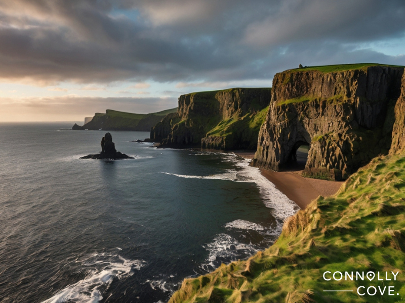 weekend breaks in northern ireland
Dramatic sea cliffs with green tops rise above a sandy beach and ocean waves at sunset—an ideal spot for memorable weekend breaks in Northern Ireland. A large sea stack sits offshore, with “Connolly Cove” written in the bottom right corner.