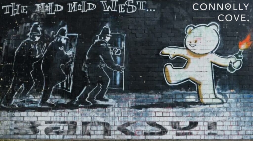 View of the famous Banksy graffiti piece titled Mild Mild West 