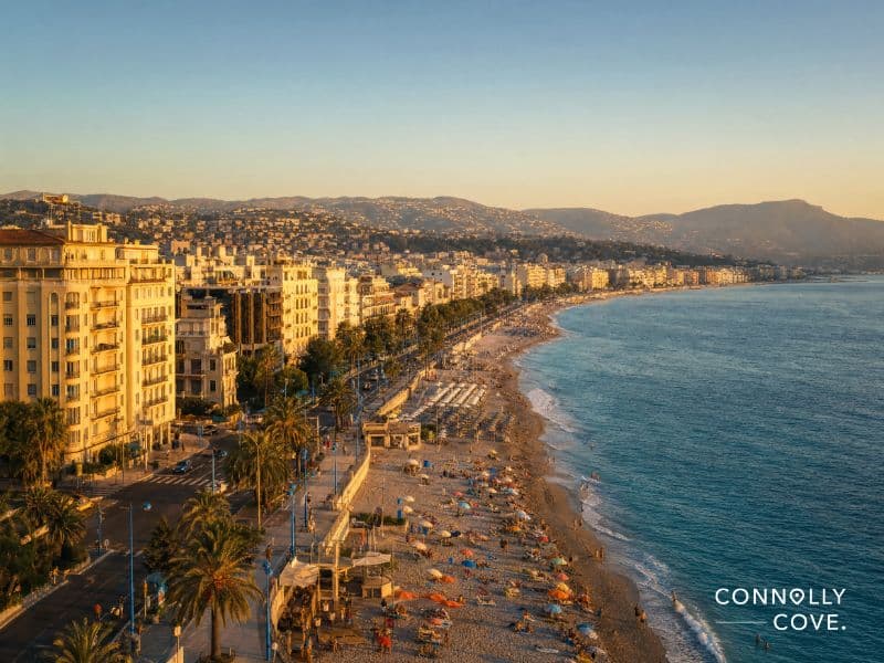 Alexandria Beach at golden hour, with sand, parasols and a curving seafront promenade on Egypt's Mediterranean coast