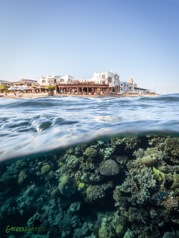 A view of the shore and the coral reef at the Lighthouse Reef in Dahab