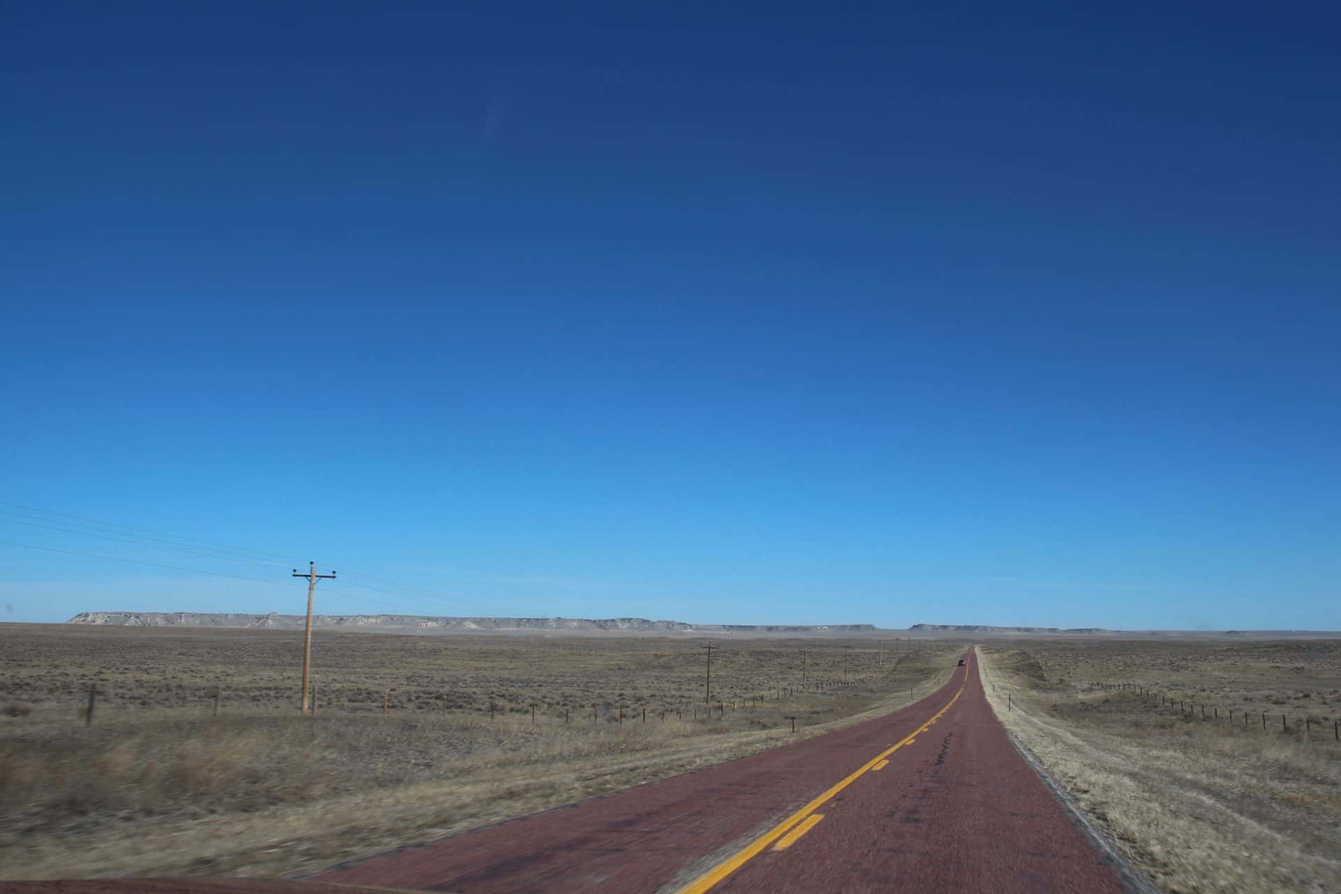 Never ending road on a road trip of America